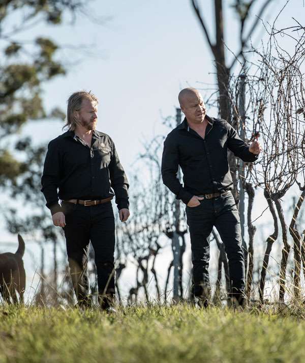 Anton and Mark Balog of Artemis Wines walking through their vineyard in the Southern Highlands